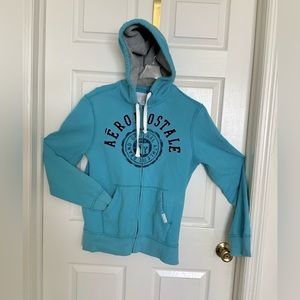 COMFY SURFER HOODIE SWEATER. Spell-out logo.